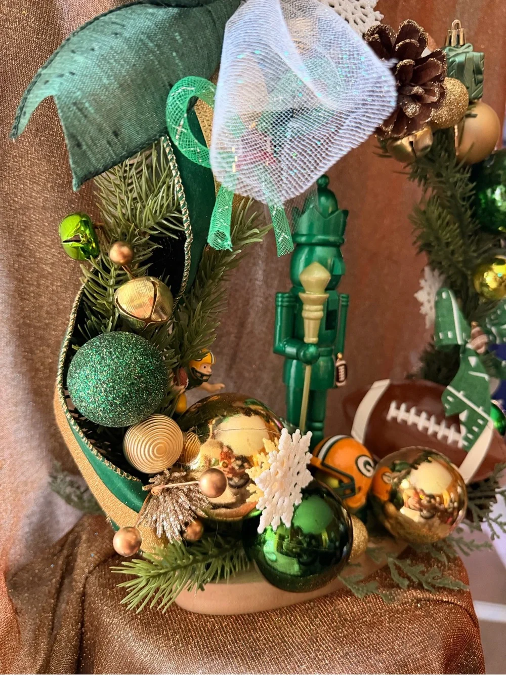 Green and Gold Holiday Wreath with Nutcracker Accent - table centerpiece